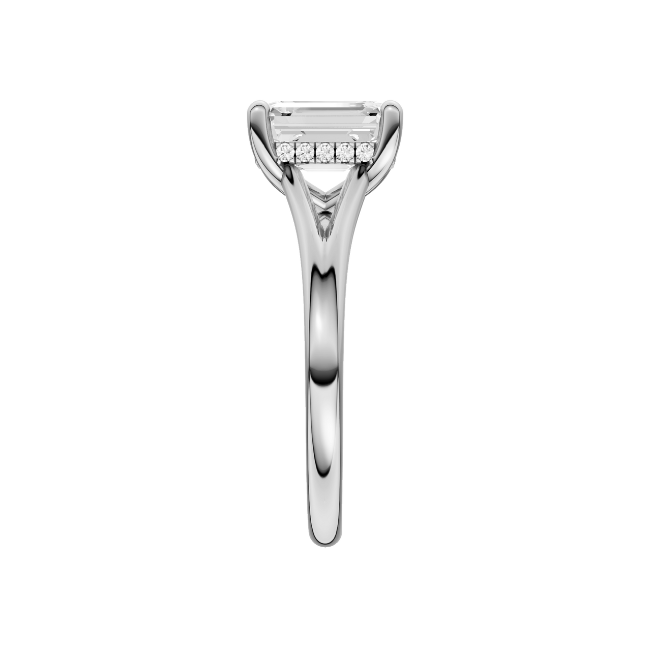 A side view of the Emerald cut diamond engagement ring in 14k white gold with a plain band and hidden halo setting