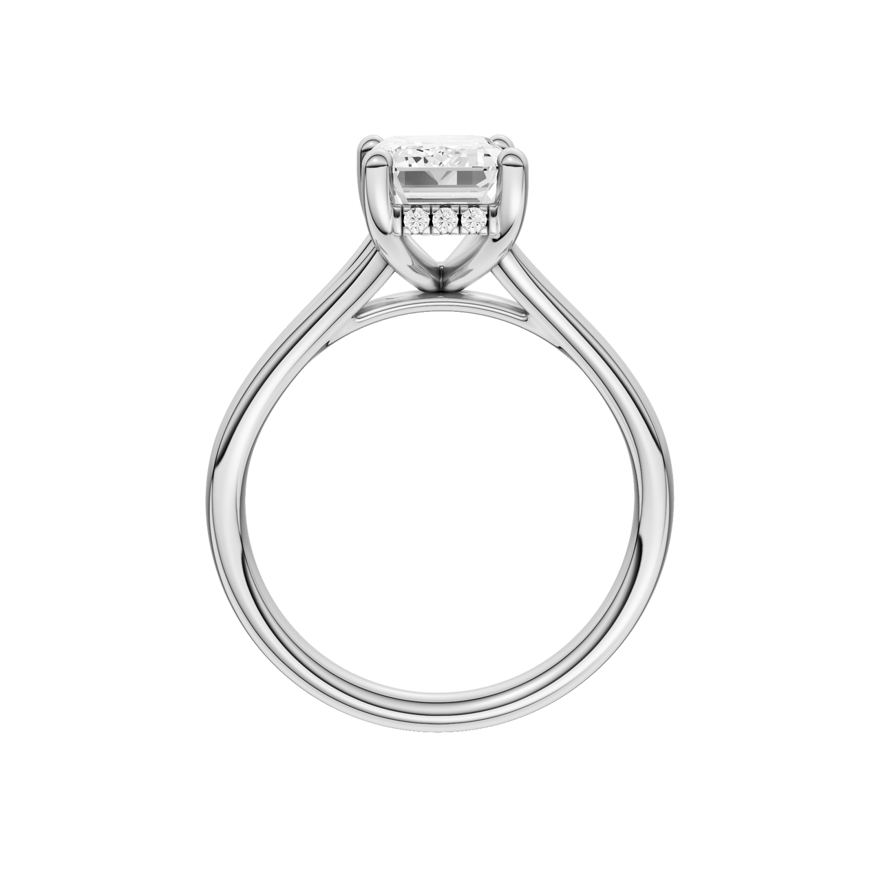 A profile view of the Emerald cut diamond engagement ring in platinum with a plain band and hidden halo setting