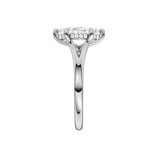 A side view of the Marquise cut diamond engagement ring in 14k white gold with a plain band and hidden halo setting