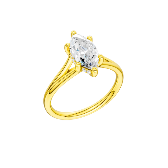 A three-quarter view of the Marquise cut diamond engagement ring in 14k yellow gold with a plain band and hidden halo setting