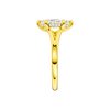 A side view of the Marquise cut diamond engagement ring in 14k yellow gold with a plain band and hidden halo setting