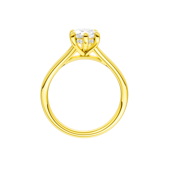A profile view of the Marquise cut diamond engagement ring in 14k yellow gold with a plain band and hidden halo setting
