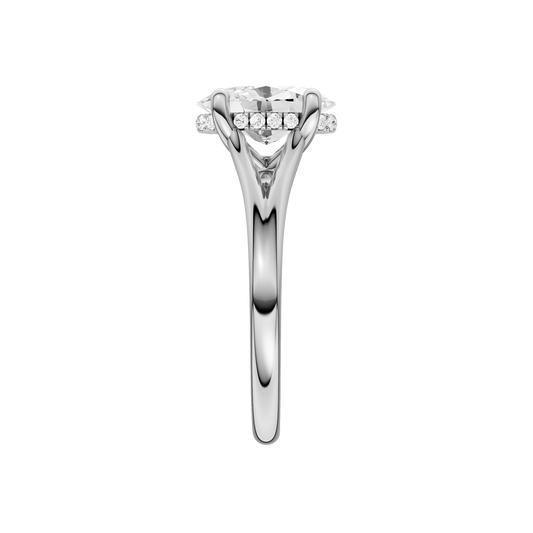 A side view of the Oval cut diamond engagement ring in 14k white gold with a plain band and hidden halo setting
