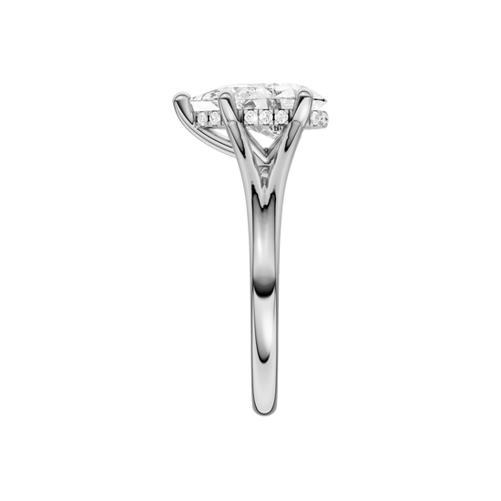 A side view of the Pear cut diamond engagement ring in 14k white gold with a plain band and cathedral setting