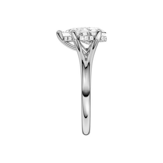 A side view of the Pear cut diamond engagement ring in 14k white gold with a plain band and cathedral setting