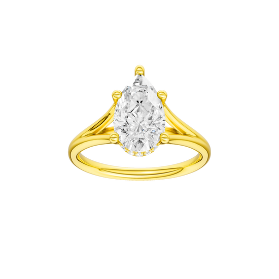 A front view of the Pear cut diamond engagement ring in 14k yellow gold with a plain band and cathedral setting