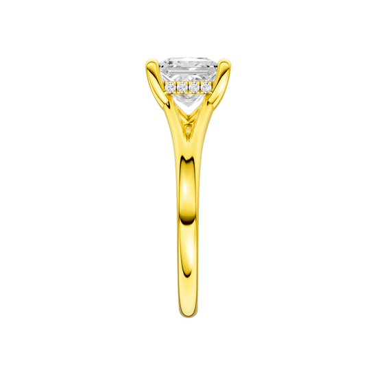 A side view of the Princess cut diamond engagement ring in 14k yellow gold with a plain band and hidden halo setting