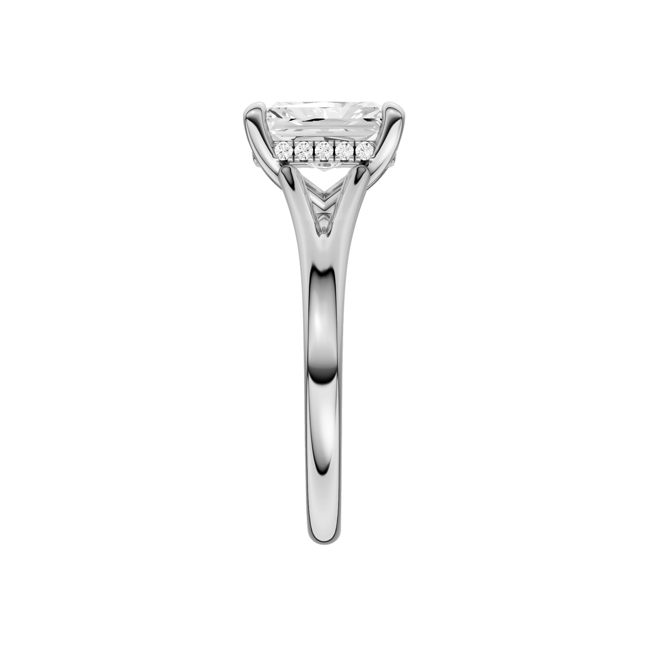 A side view of the Radiant cut diamond engagement ring in platinum with a plain band and hidden halo setting