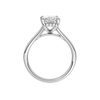 A profile view of the Radiant cut diamond engagement ring in 14k white gold with a plain band and hidden halo setting