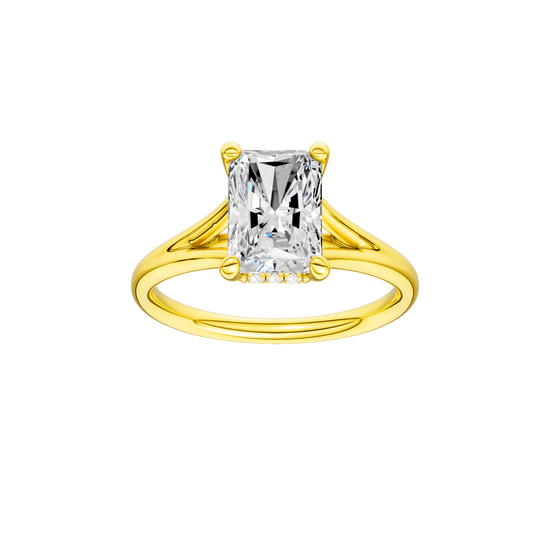 A front view of the Radiant cut diamond engagement ring in 14k yellow gold with a plain band and hidden halo setting