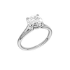 A three-quarter view of the Round cut diamond engagement ring in platinum with a plain band and hidden halo setting
