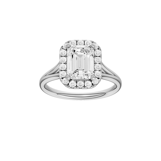 A front view of the Emerald cut diamond engagement ring in 14k white gold with a plain band and halo setting