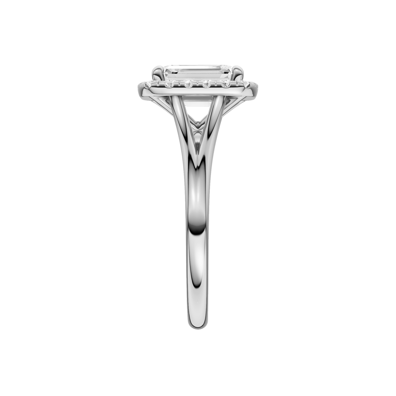 A side view of the Emerald cut diamond engagement ring in platinum with a plain band and halo setting