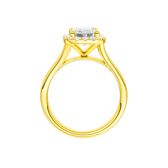 A profile view of the Emerald cut diamond engagement ring in 14k yellow gold with a plain band and halo setting