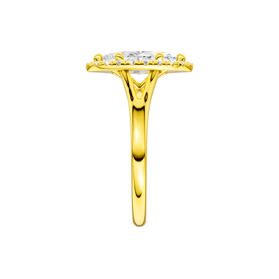 A side view of the Marquise cut diamond engagement ring in 14k yellow gold with a plain band and solitaire setting