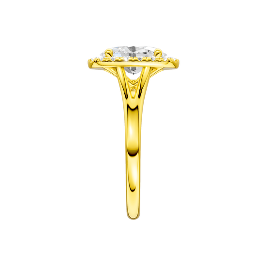 A side view of the Oval cut diamond engagement ring in 14k yellow gold with a plain band and solitaire setting