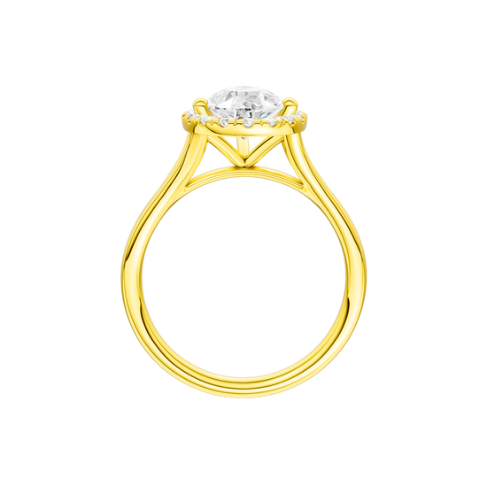 A profile view of the Pear cut diamond engagement ring in 14k yellow gold with a plain band and solitaire setting