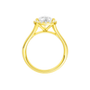 A profile view of the Pear cut diamond engagement ring in 14k yellow gold with a plain band and solitaire setting