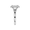 A side view of the Radiant cut diamond engagement ring in platinum with a plain band and halo setting