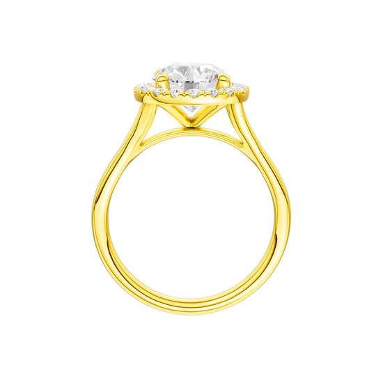 A profile view of the Round cut diamond engagement ring in 14k yellow gold with a plain band and halo setting