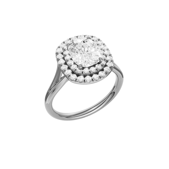 A three-quarter view of the Elongated Cushion cut diamond engagement ring in 14k white gold with a plain band and double halo setting