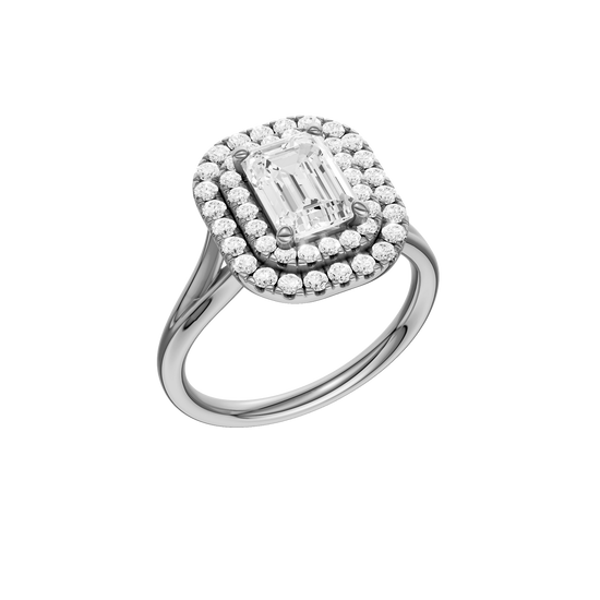 A three-quarter view of the Emerald cut diamond engagement ring in 14k white gold  with a plain band and double halo setting