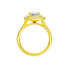 A profile view of the Emerald cut diamond engagement ring in 14k yellow gold  with a plain band and double halo setting