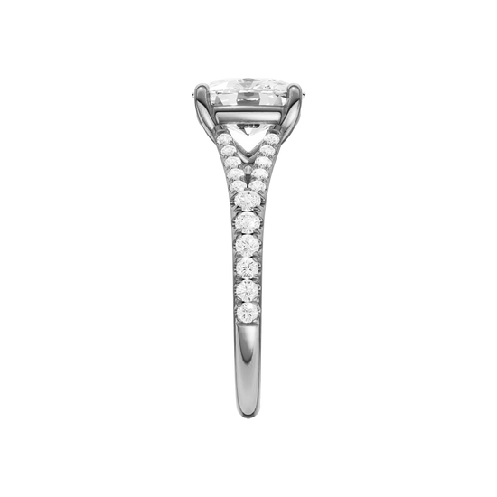 A side view of the Elongated Cushion cut diamond engagement ring in platinum with a prong band and solitaire setting