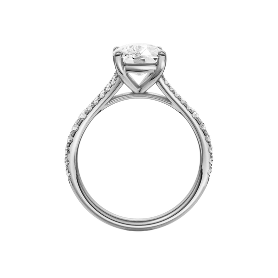 A profile view of the Elongated Cushion cut diamond engagement ring in platinum with a prong band and solitaire setting