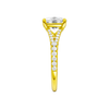 A side view of the Elongated Cushion cut diamond engagement ring in 14k yellow gold with a prong band and solitaire setting