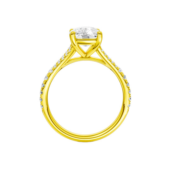 A profile view of the Elongated Cushion cut diamond engagement ring in 14k yellow gold with a prong band and solitaire setting