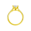 A profile view of the Oval cut diamond engagement ring in 14k yellow gold with a prong band and solitaire setting