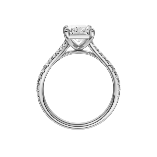 A profile view of the Radiant cut diamond engagement ring in 14k white gold with a diamond band and solitaire setting