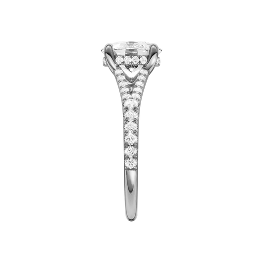A side view of the Elongated Cushion cut diamond engagement ring in 14k white gold with a diamond band and hidden halo setting