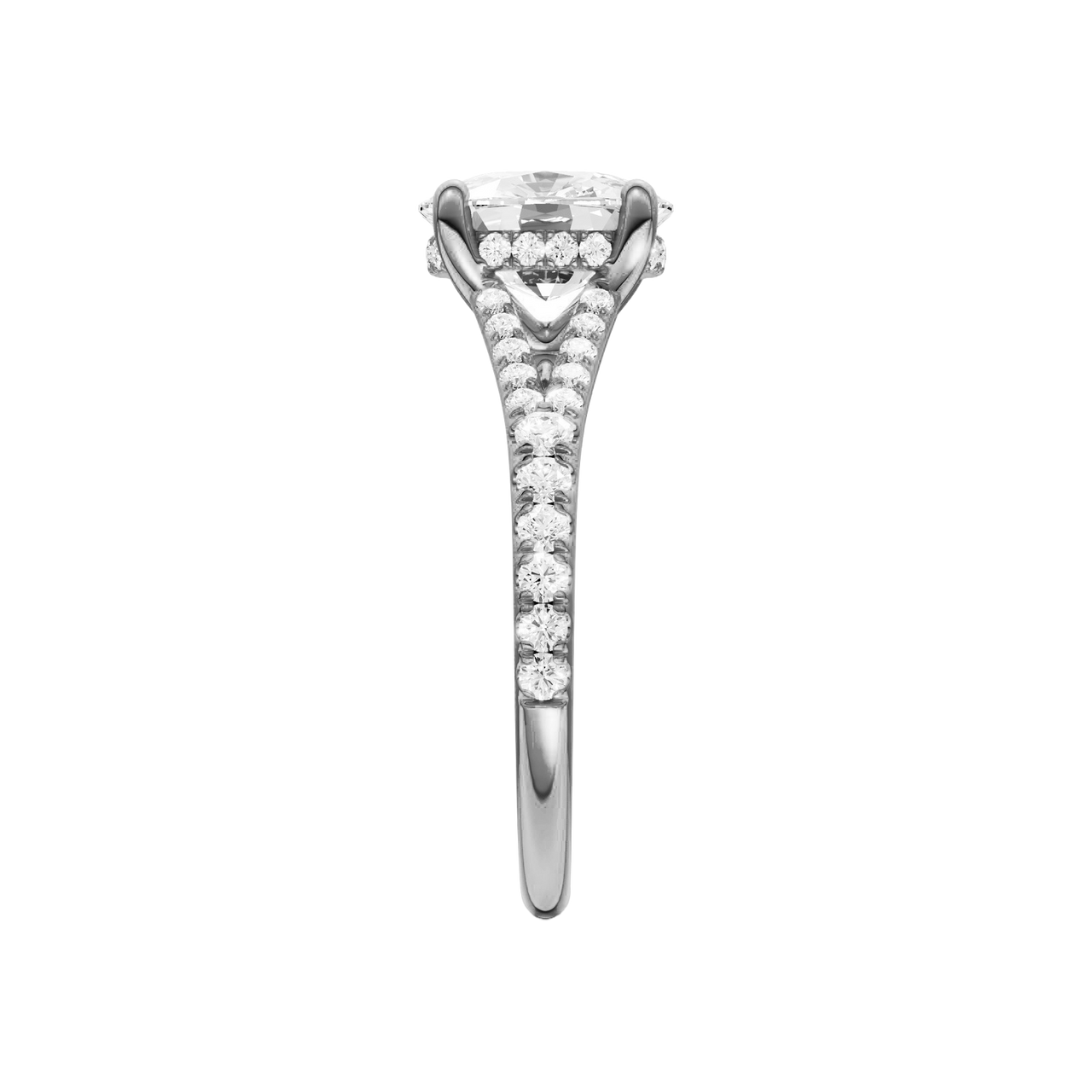 A side view of the Elongated Cushion cut diamond engagement ring in platinum with a diamond band and hidden halo setting
