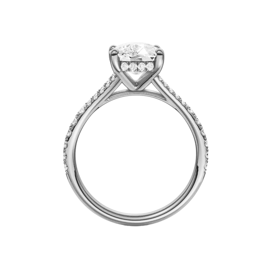 A profile view of the Elongated Cushion cut diamond engagement ring in platinum with a diamond band and hidden halo setting