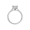 A profile view of the Marquise cut diamond engagement ring in platinum with a prong band and hidden halo setting