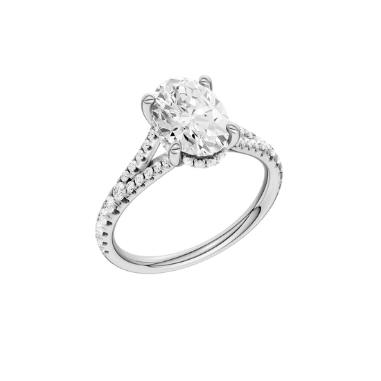 A three-quarter view of the Oval cut diamond engagement ring in 14k white gold with a prong band and hidden halo setting