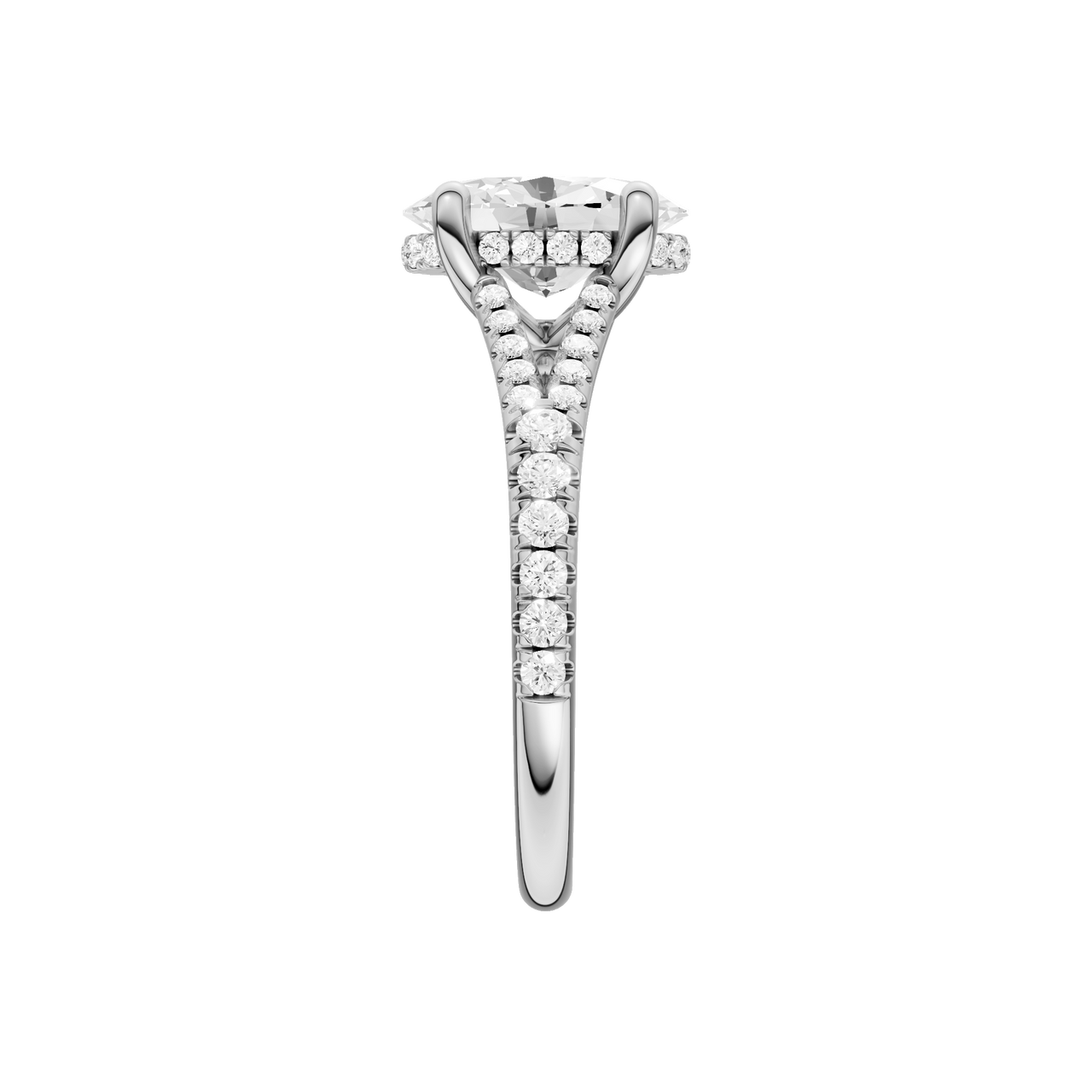 A side view of the Oval cut diamond engagement ring in 14k white gold with a prong band and hidden halo setting