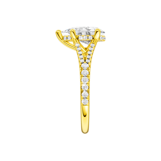 A side view of the Pear cut diamond engagement ring in 14k yellow gold with a prong band and cathedral setting