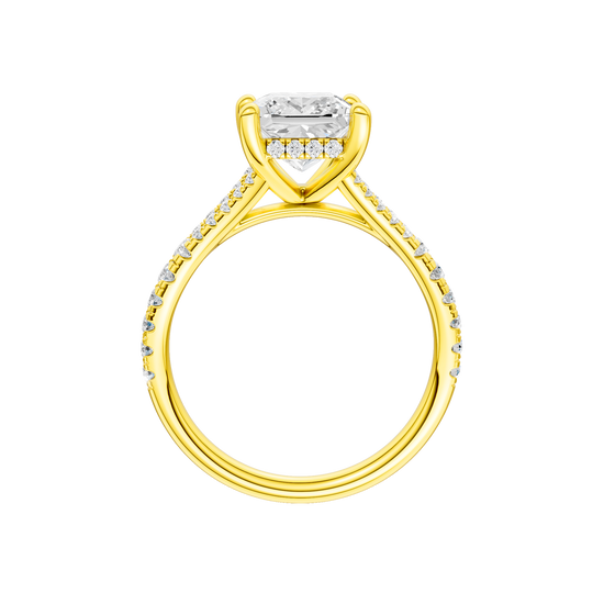 A profile view of the Princess cut diamond engagement ring in 14k yellow gold with a prong band and hidden halo setting