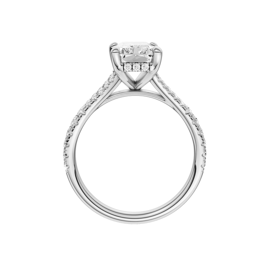 A profile view of the Radiant cut diamond engagement ring in 14k white gold with a prong band and hidden halo setting