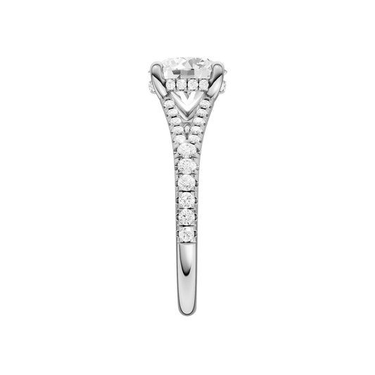 A side view of the Round cut diamond engagement ring in 14k white gold with a prong band and hidden halo setting