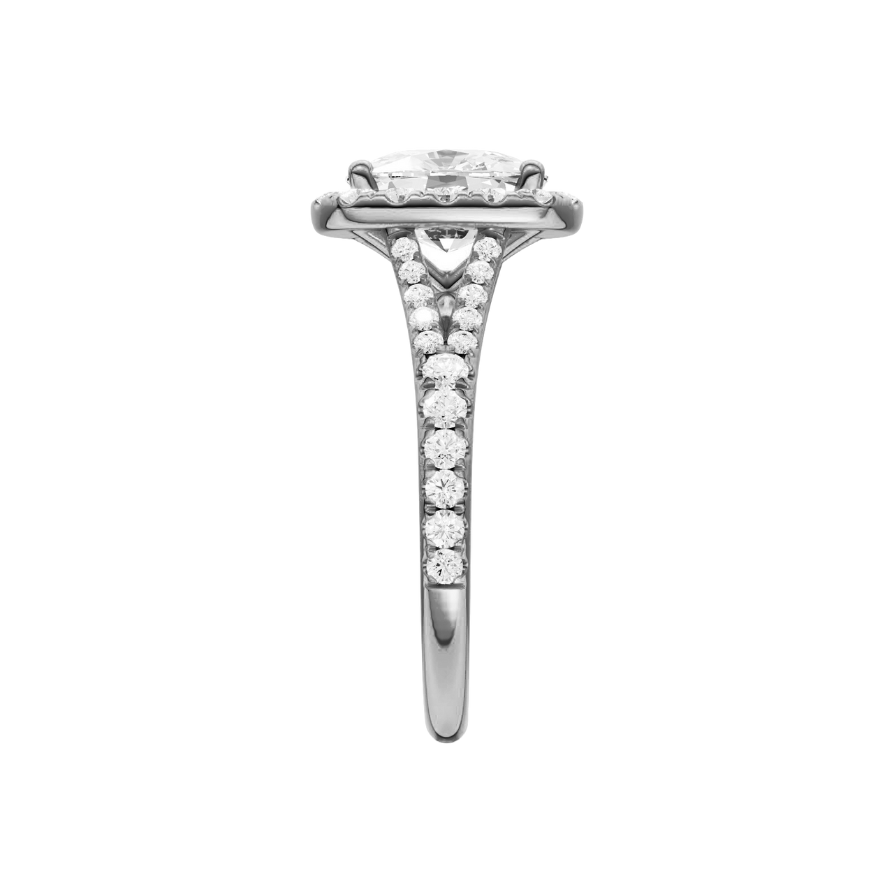 A side view of the Elongated Cushion cut diamond engagement ring in 14k white gold with a prong band and halo setting