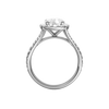 A profile view of the Elongated Cushion cut diamond engagement ring in 14k white gold with a prong band and halo setting