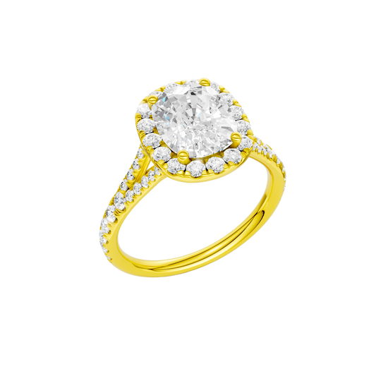A three-quarter view of the Elongated Cushion cut diamond engagement ring in 14k yellow gold with a prong band and halo setting