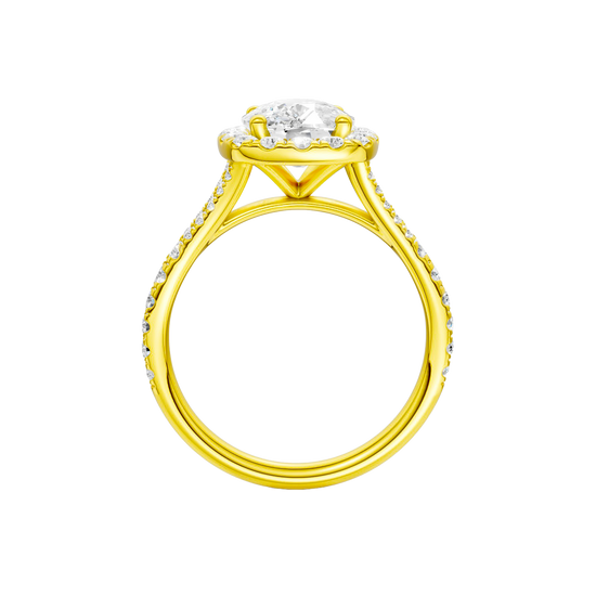 A profile view of the Elongated Cushion cut diamond engagement ring in 14k yellow gold with a prong band and halo setting