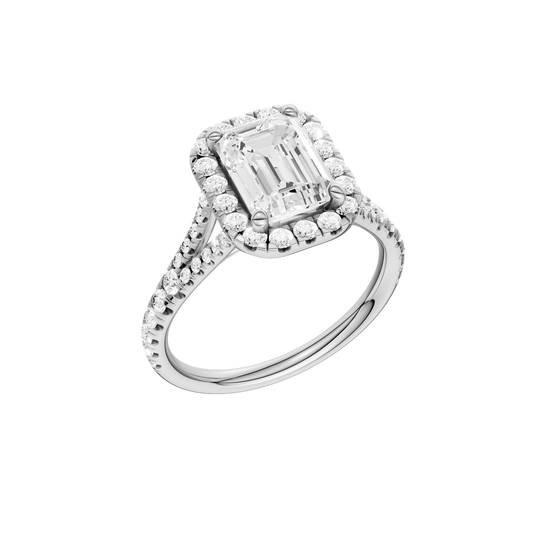 A three-quarter view of the Emerald cut diamond engagement ring in platinum with a prong band and solitaire setting
