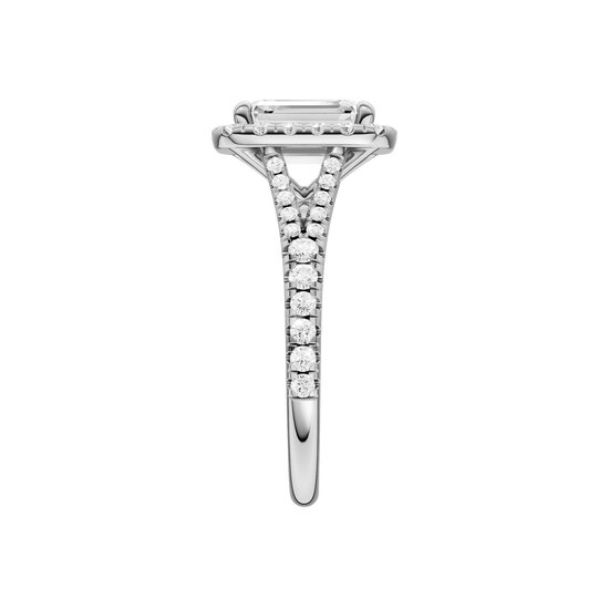 A side view of the Emerald cut diamond engagement ring in platinum with a prong band and solitaire setting