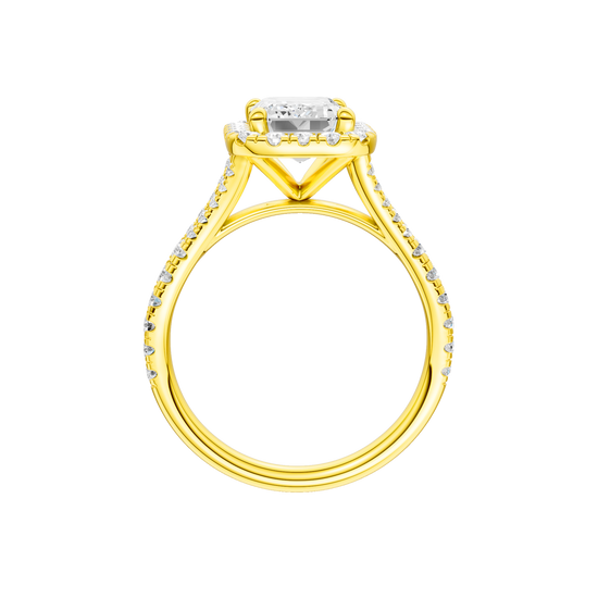 A profile view of the Emerald cut diamond engagement ring in 14k yellow gold with a prong band and solitaire setting
